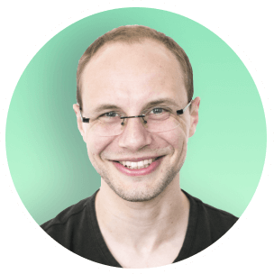 photo of smiling Mateusz, a developer